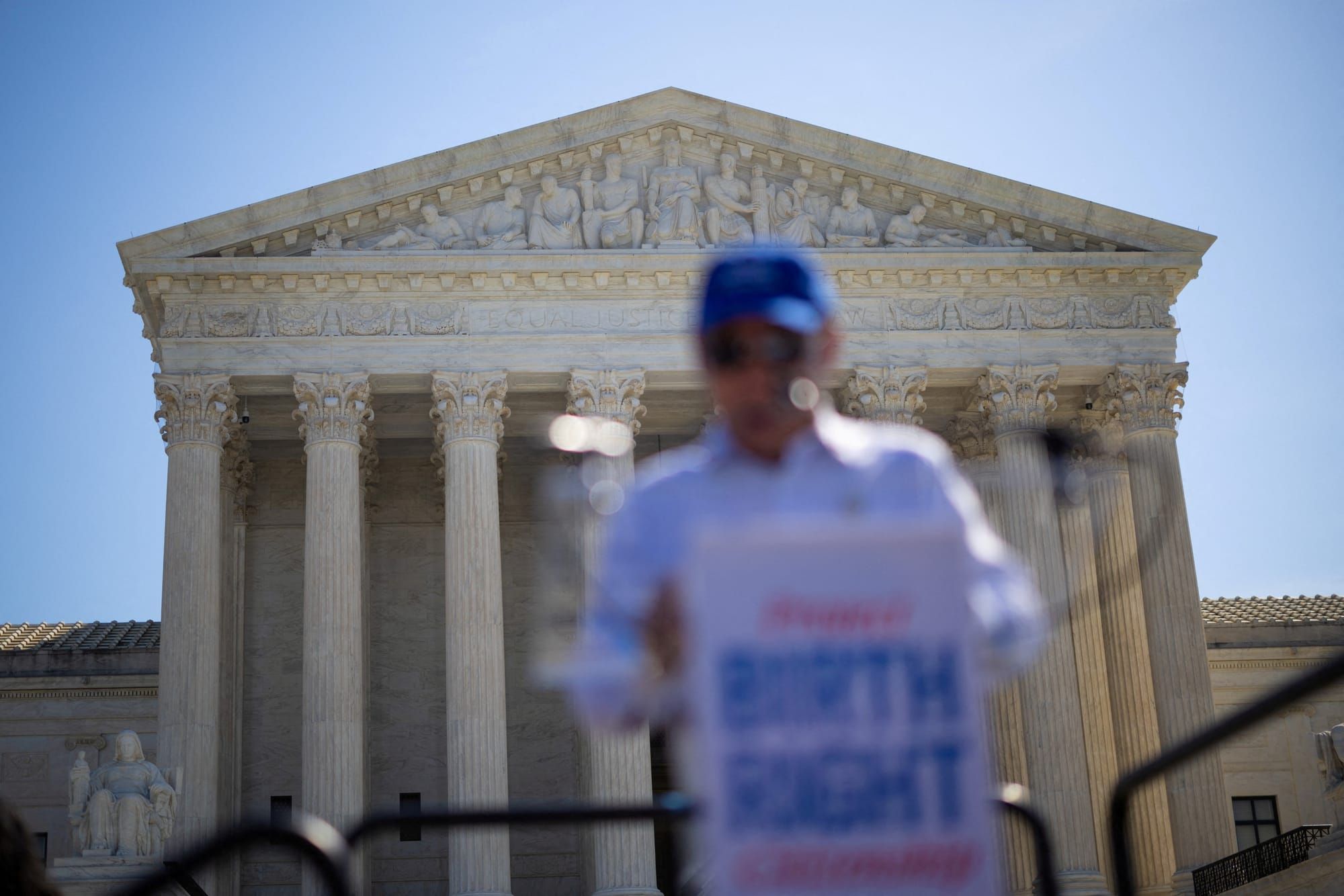 Norman Wong, the great-grandson of Wong Kim Ark, speaks during a demonstration outside the U.S. Supreme Court building | REUTERS/Carlos Barria, edited by Russell Nystrom