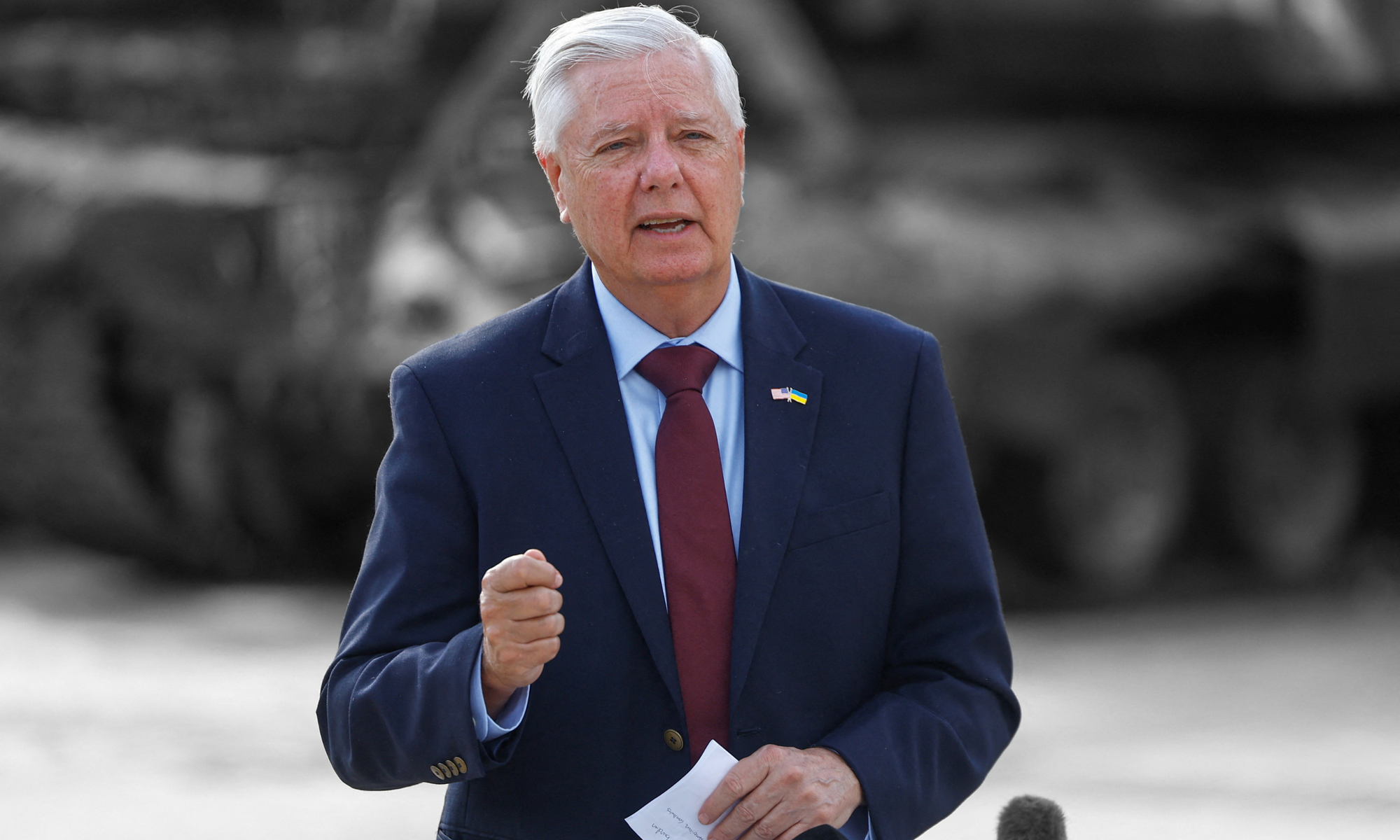 Sen. Lindsey Graham (R-SC) speaking in Kyiv, Ukraine, on July 10 | REUTERS/Valentyn Ogirenko, edited by Russell Nystrom