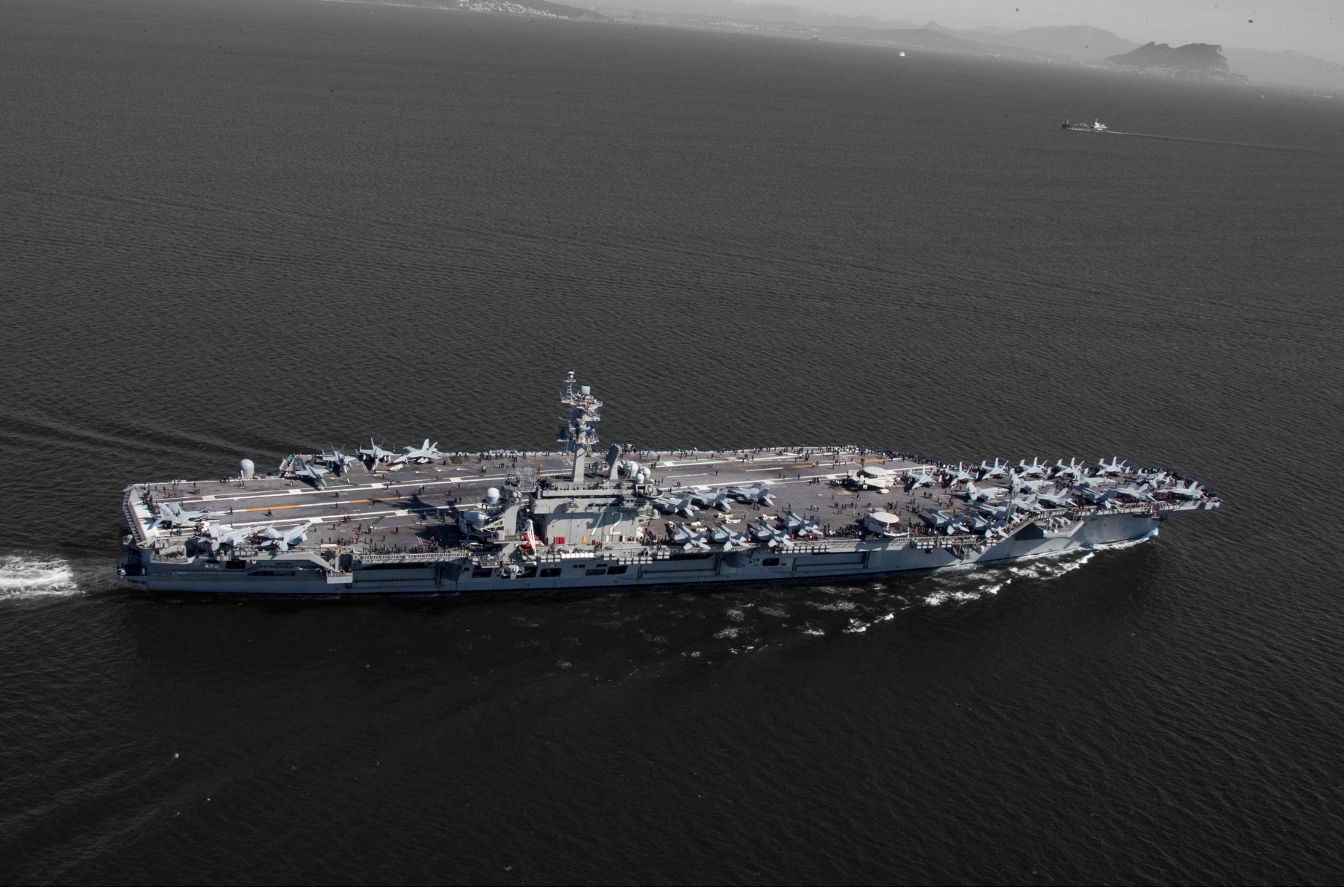  The USS Abraham Lincoln (CVN 72) transits the Strait of Gibraltar in April, 2019.