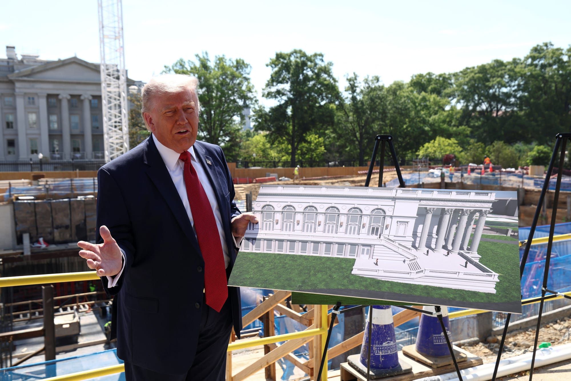  President Donald Trump shows images of the ballroom concept at the White House in Washington, D.C. | REUTERS/Kevin Lamarque