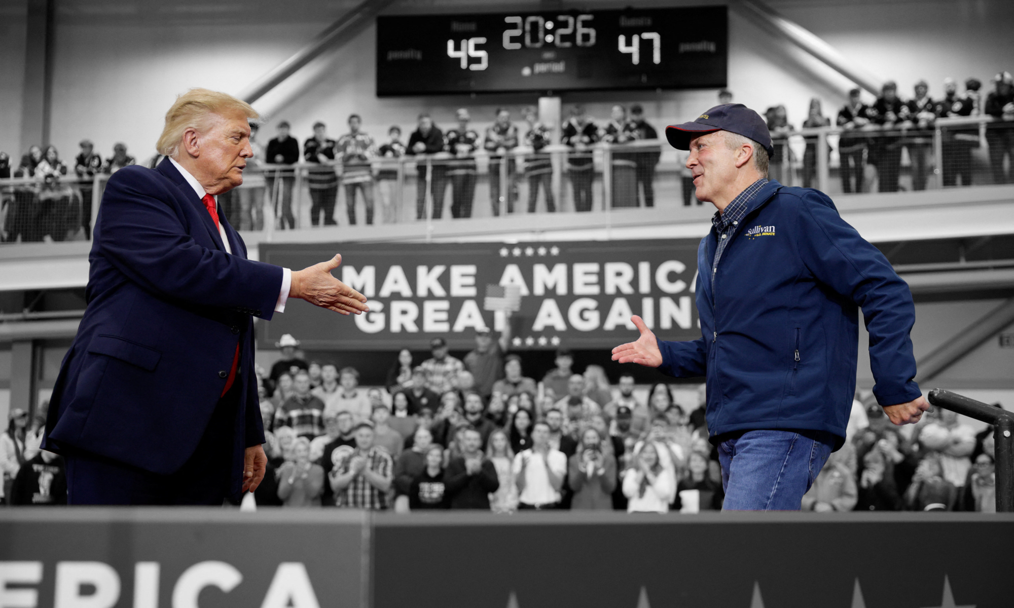 President Donald Trump on stage with Sen. Dan Sullivan (R) in Alaska 