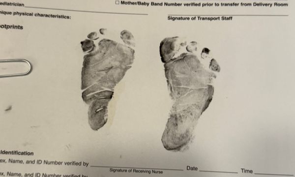 Baby footprints on a medical document.