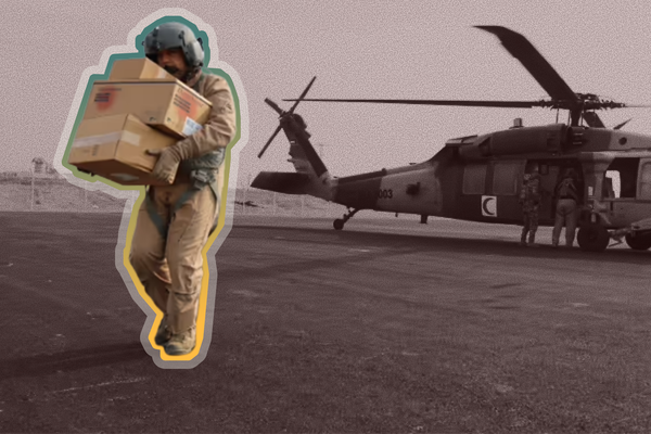 A member of the Jordanian air forces unloads aid during a ceasefire at Kissufim Crossing — January 28, 2025 | REUTERS/Jehad Shelbak REFILE