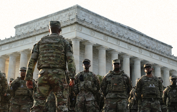 Members of the U.S. National Guard stand together at the National Mall in Washington, D.C. | REUTERS/Nathan Howard TPX IMAGES OF THE DAY, edited by Russell Nystrom, Tangle