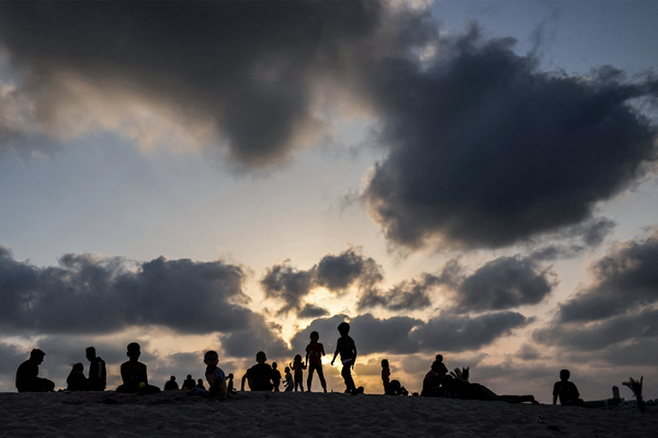 Children at a camp housing displaced Palestinians in Rafah, Gaza, on in 2024 | Photo by AFP via Getty Images, edited by Russell Nystrom