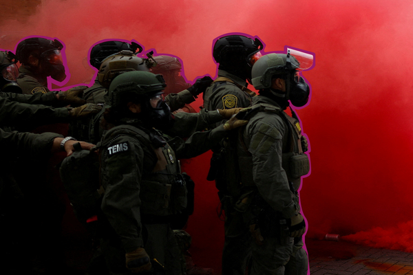 Law enforcement officers at protests in Portland, Oregon | REUTERS/Carlos Barria TPX IMAGES OF THE DAY, edited by Russell Nystrom