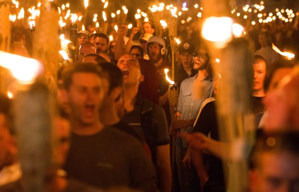 The 'Unite the Right' rally in Charlottesville, VA | Photo by Zach D Roberts/NurPhoto via Getty Images)