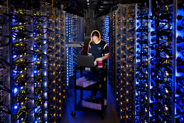 A Google engineer at a Google Data Center in 2012 | Connie Zhou/Google/ZUMAPRESS.com, edited by Russell Nystrom