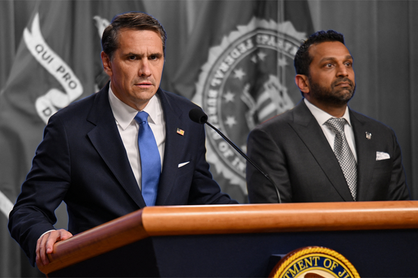Acting U.S. Attorney General Todd Blanche speaks as FBI Director Kash Patel stands by his side during a press conference | REUTERS/Annabelle Gordon, edited by Russell Nystrom