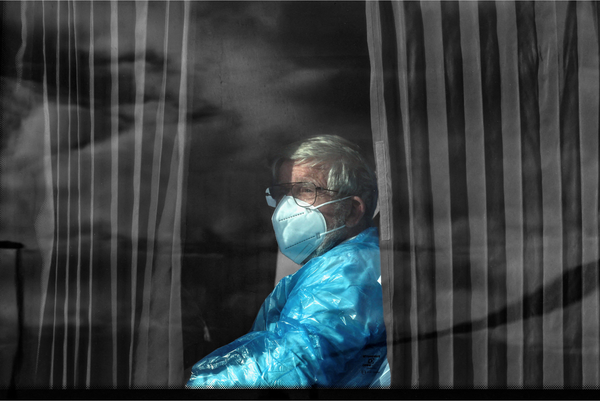 A passenger on the cruise ship MV Hondius in Tenerife, Spain | REUTERS/Hannah McKay, edited by Russell Nystrom