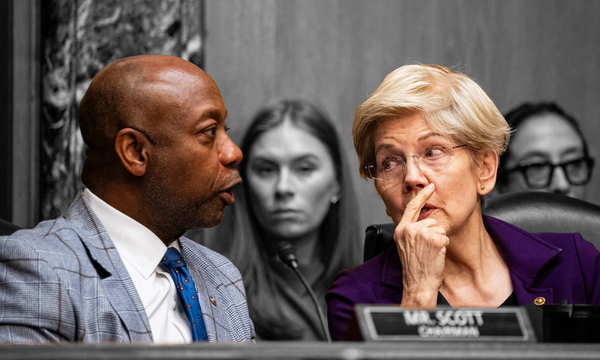 Sen. Tim Scott (R-SC) and Sen. Elizabeth Warren (D-MA) during a Senate Banking, Housing, and Urban Affairs Committee hearing — February 5, 2026