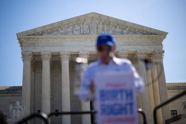 Norman Wong, the great-grandson of Wong Kim Ark, speaks during a demonstration outside the U.S. Supreme Court building | REUTERS/Carlos Barria, edited by Russell Nystrom