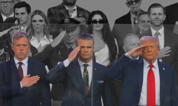 (from left) Then-Secretary of the Army Daniel Driscoll, Secretary of Defense Pete Hegseth, and President Donald Trump attend a military parade | REUTERS/Carlos Barria, edited by Russell Nystr