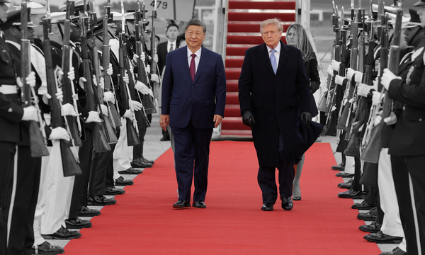 Chinese President Xi Jinping and U.S. President Donald Trump at Joint Base Andrews in Maryland | REUTERS/Jonathan Ernst, edited by Russell Nystrom