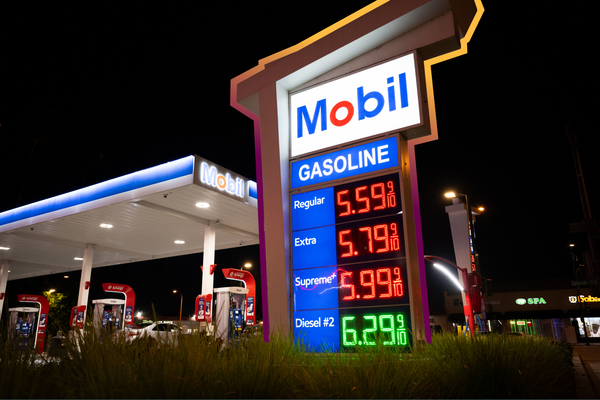 Gasoline prices displayed on a Mobil gas station in California | Weston Hancock/SOPA Images, edited by Russell Nystrom