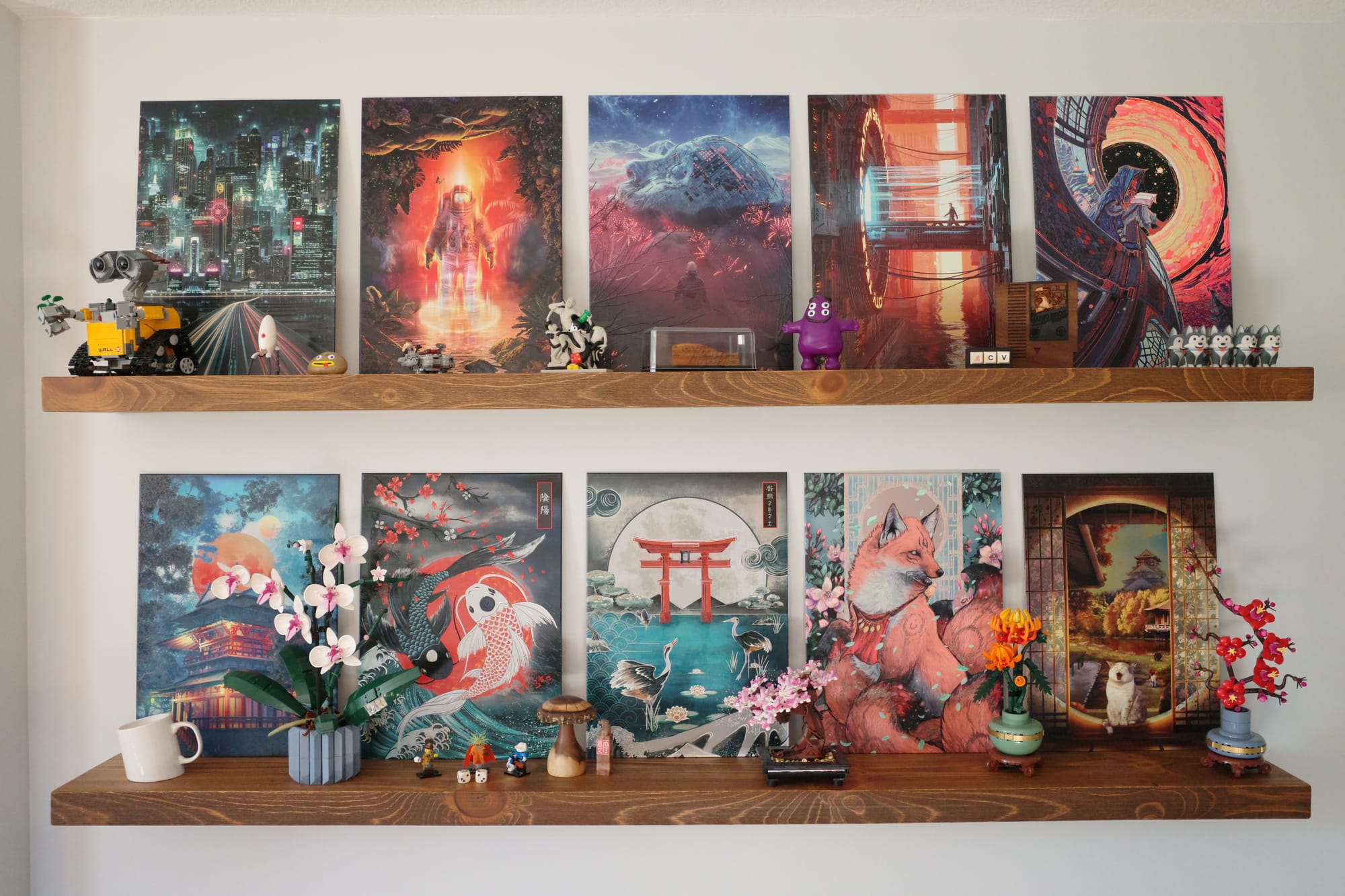 Two rows of floating wall shelves; each has five Displates on it, with a variety of LEGOs & other small statues/toys