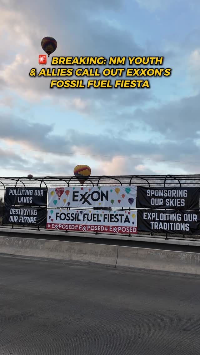 YUCCA and @oilandgassactionnetwork drop banner near entrance to Ballon Fiesta Park