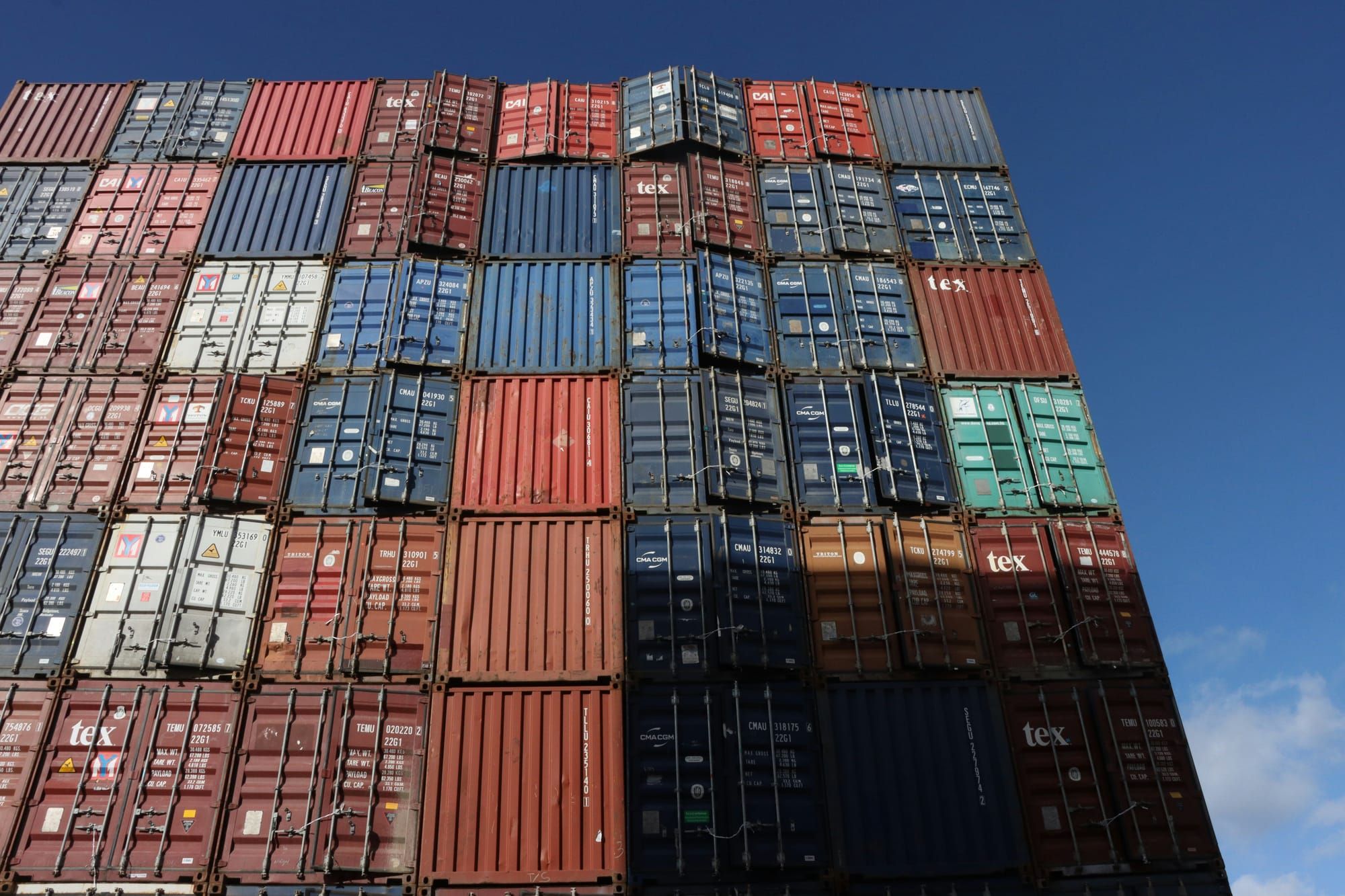 Empty shipping containers waiting at a container terminal during equipment shortage