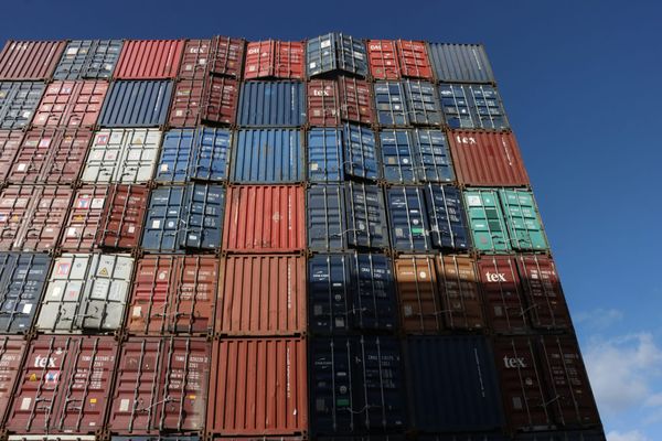 Empty shipping containers waiting at a container terminal during equipment shortage