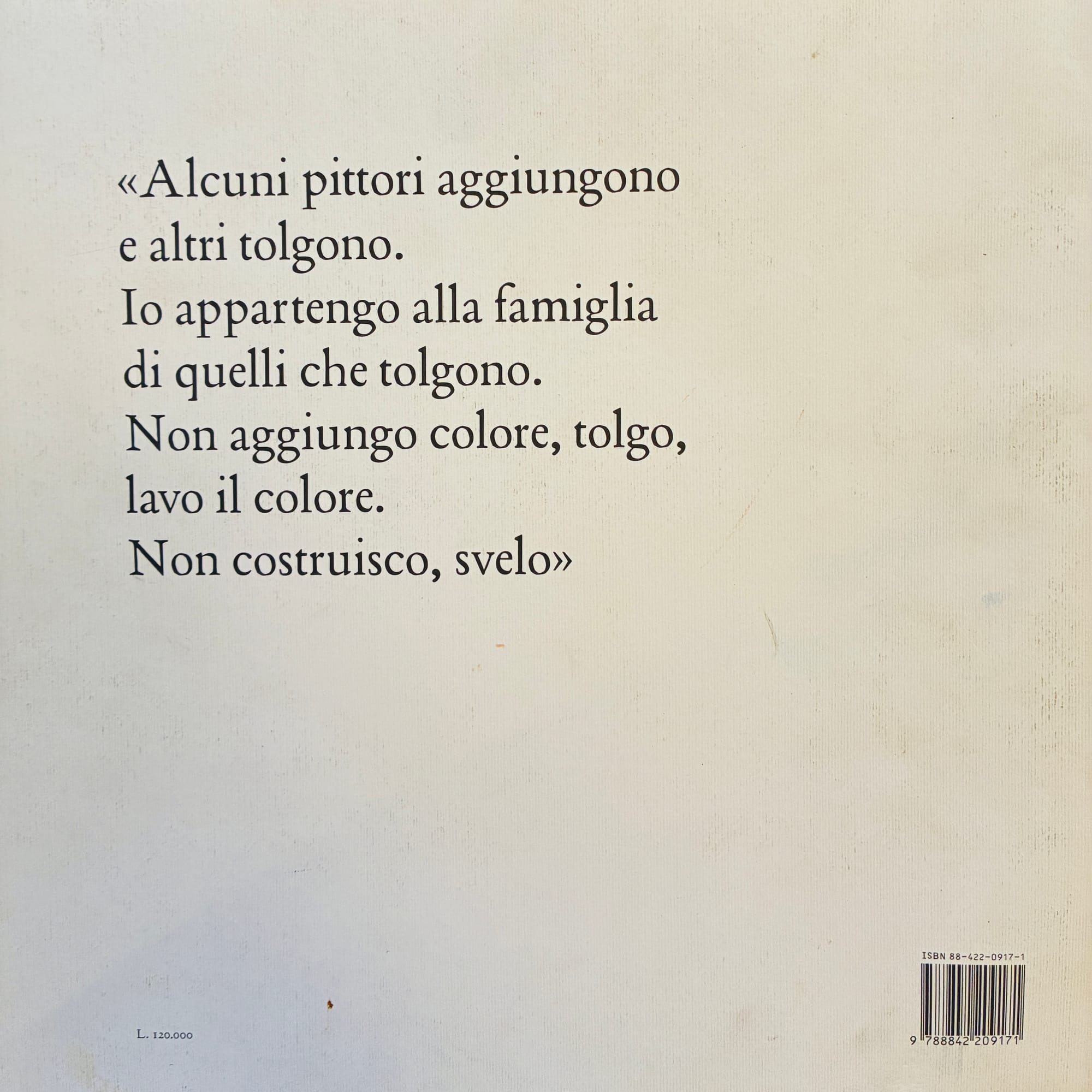 Back cover of Francesco Clemente catalog showing an Italian quote about artistic subtraction and revelation. Text reads: "Some painters add, others subtract. I belong to those who subtract. I don’t add color, I take it away. I don’t construct, I reveal."