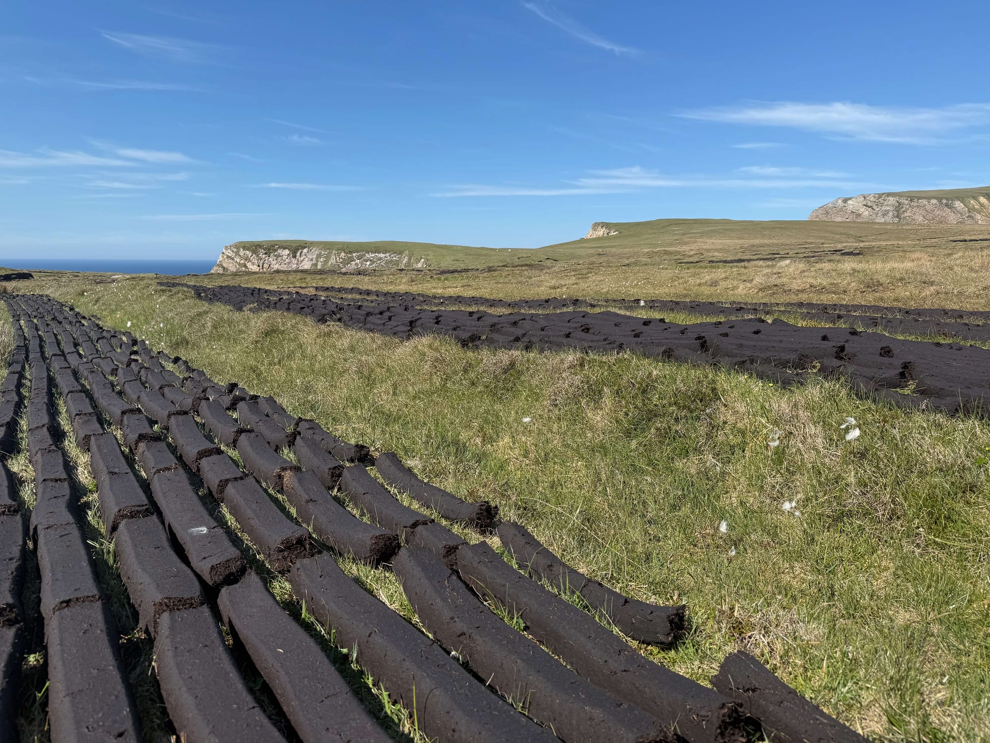 Bog Turf laying out to dry at Benwee Head