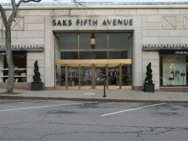 Company behind Saks Fifth Avenue exits bankruptcy with massive job cuts