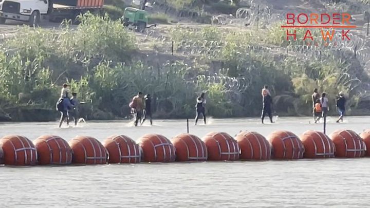 EXCLUSIVE: Migrants Walking Around Texas Marine Barrier to Reach Border Patrol, Claim Asylum