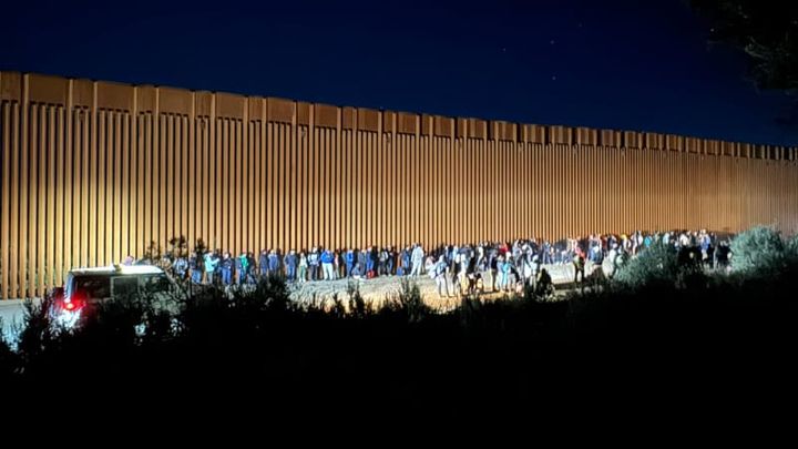 WATCH: Hundreds of Illegals Enter San Diego After ‘Men in Black Masks’ Cut Border Fence