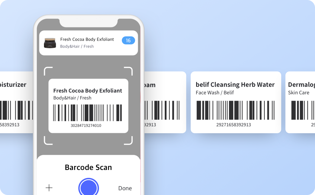 Phone screen showing a barcode-scan view for “Fresh Cocoa Body Exfoliant” with barcode cards lined up behind.