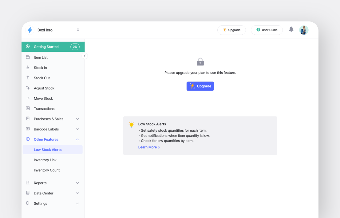 BoxHero Low Stock Alerts Screen prompting an Upgrade for Access to Premium Feature