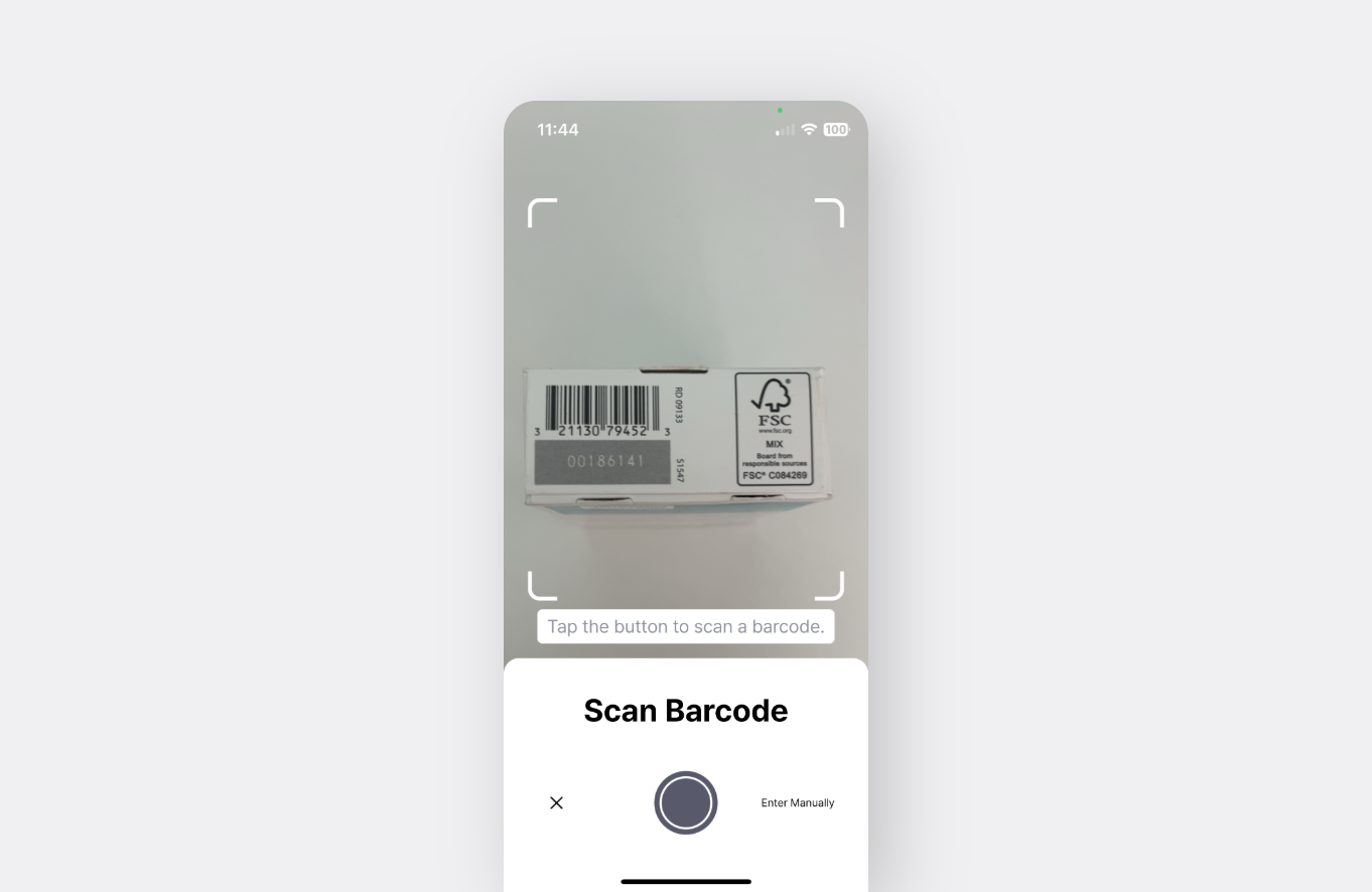 BoxHero mobile app barcode scanning feature using a phone camera to capture product barcodes for inventory tracking.