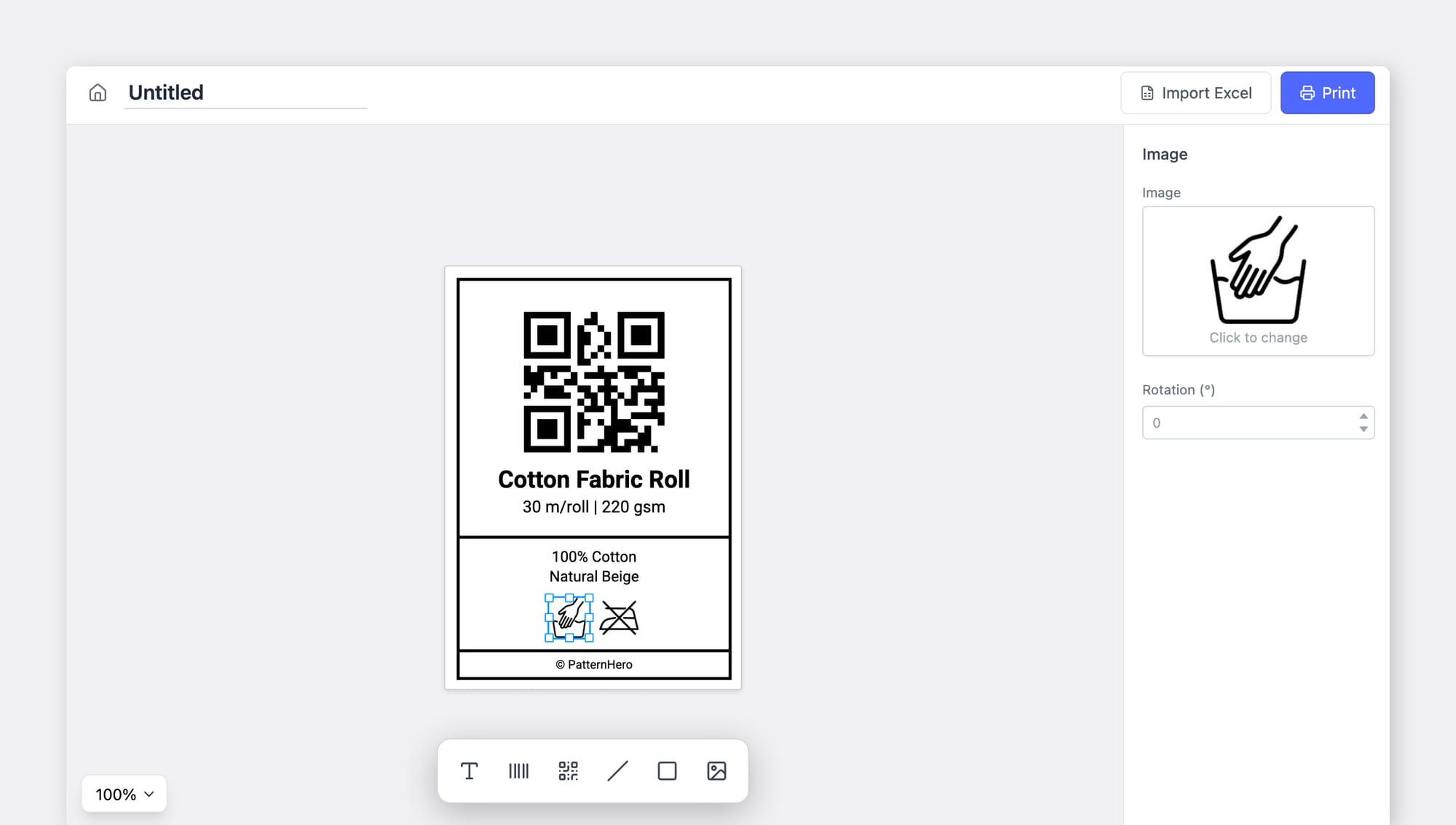 BoxHero label designer building a Cotton Fabric Roll label with a QR code, product specs, and laundry care symbols.