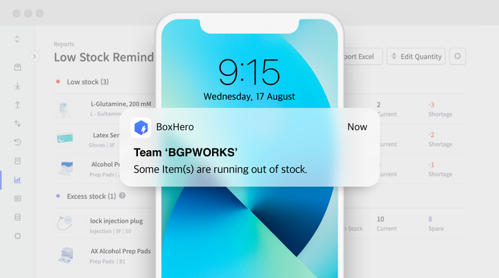 Low Stock Alert Phone notification from BoxHero: Team Name over a blurred low-stock report