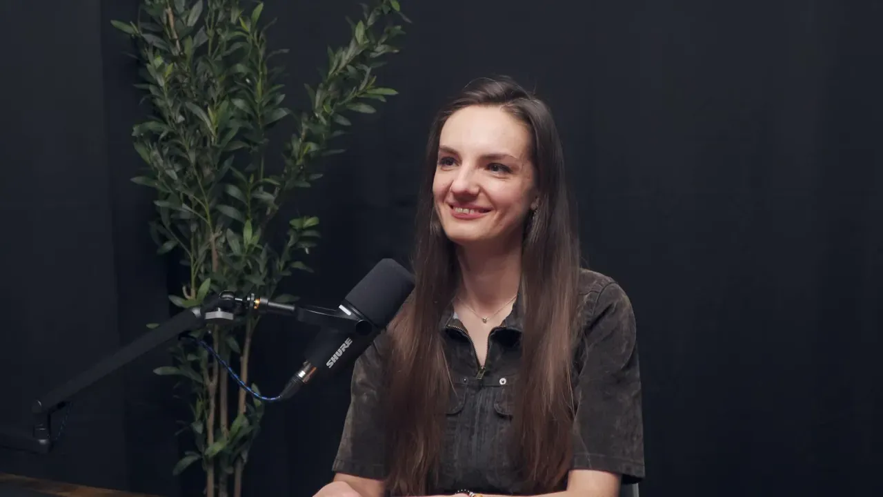 Dr. Hanna introduced in the studio, smiling and settling in.