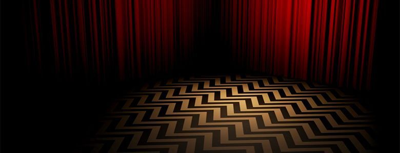 A mysterious room with walls made of red velvet curtains. The floor is a distinctive white and black chevron pattern.