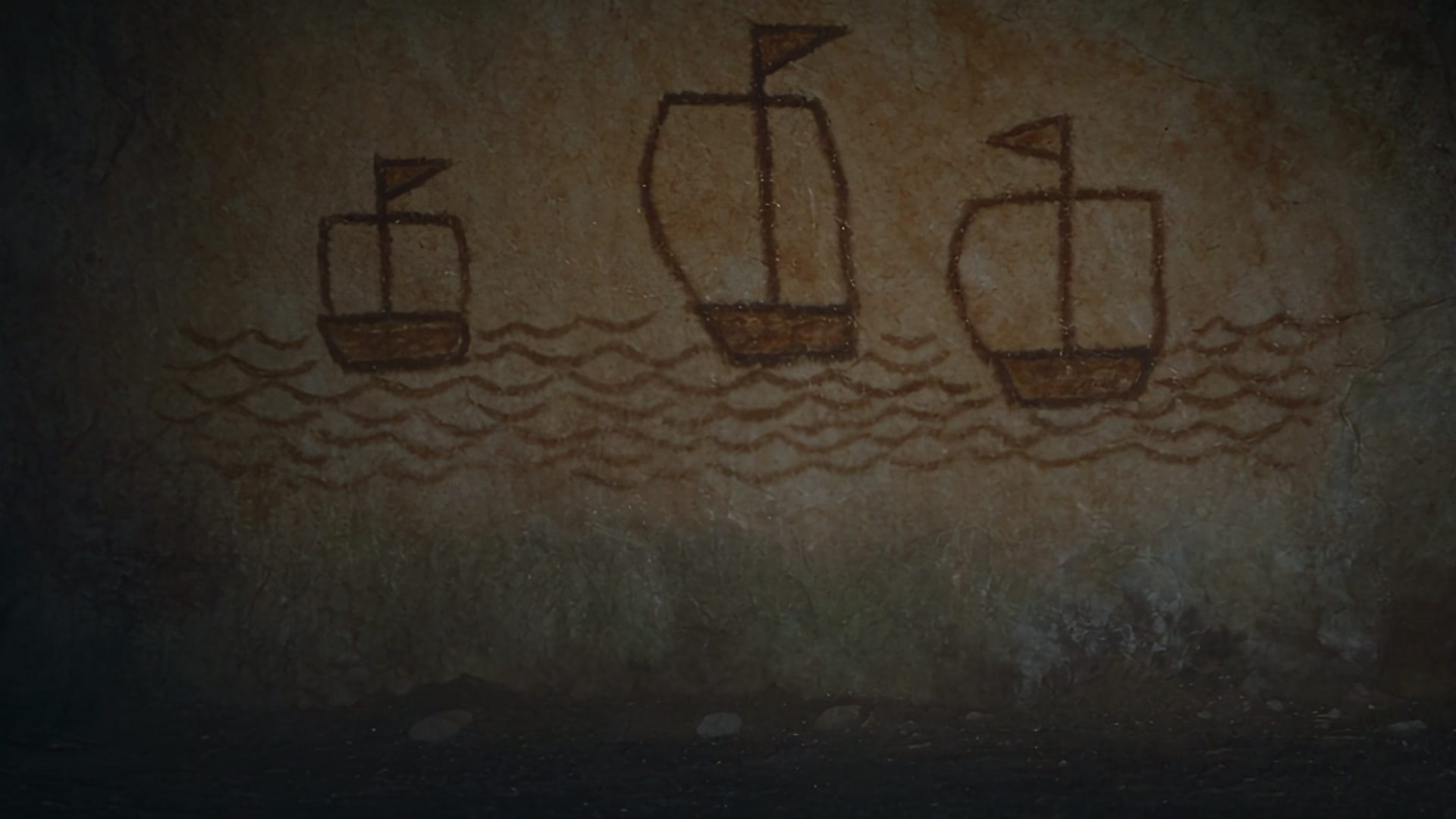 Three sailing boats painted on a cave wall above wavy lines for water