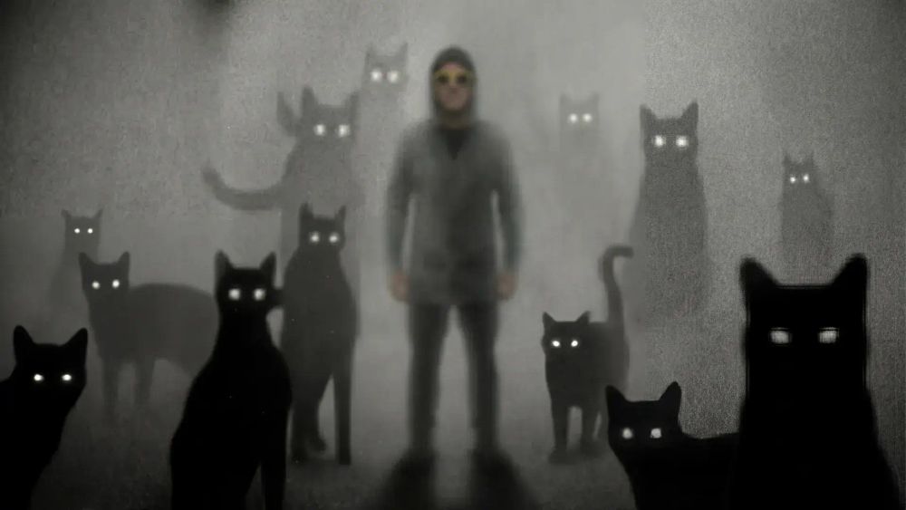 Person examining old photographs and documents spread across a desk, collecting memories under warm lamplight