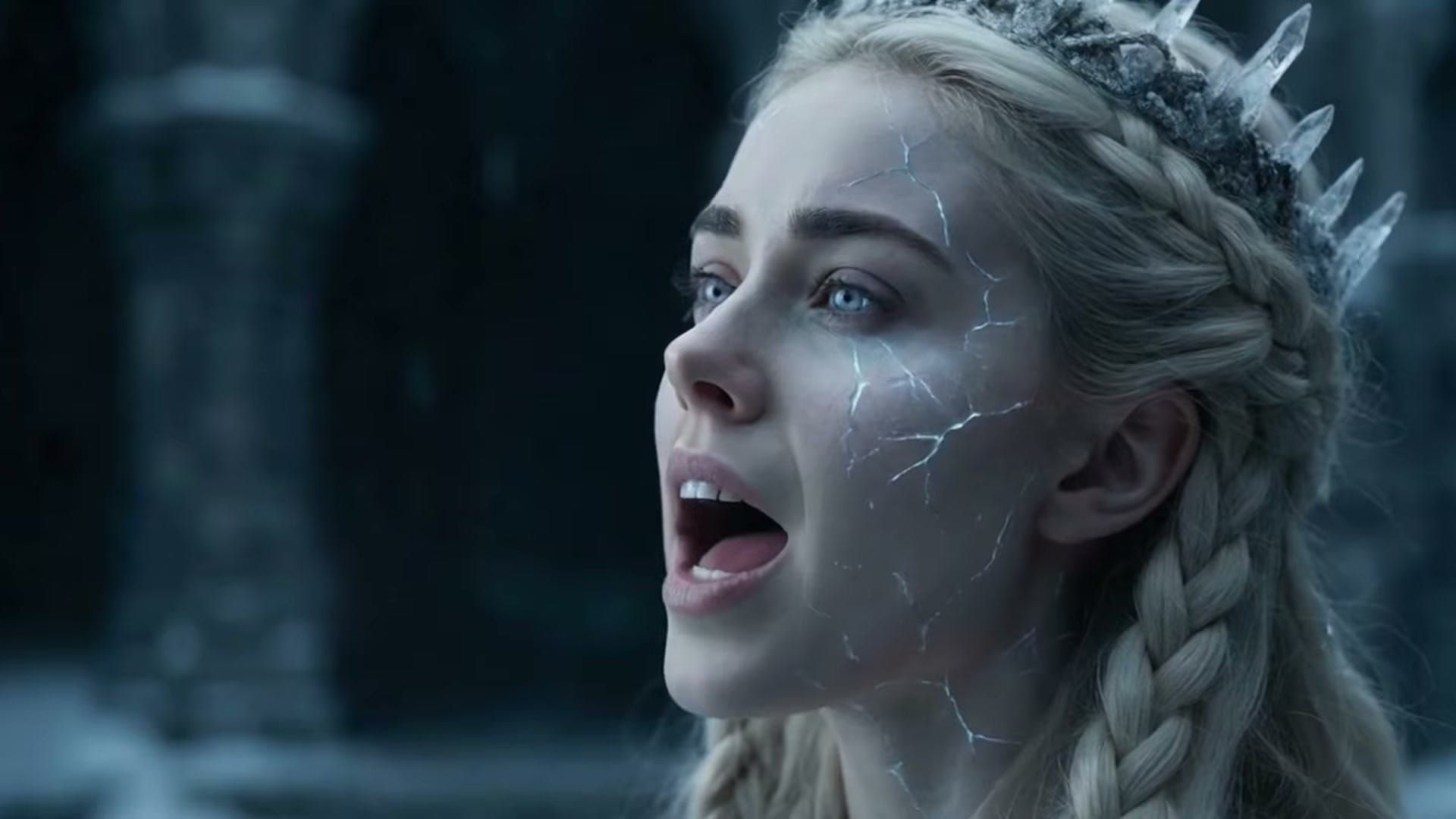 A singer with ice-cracked skin and a crystal crown, mid-note, in a still from WARYAUME's "Morjaal keldr vak (version duo)."