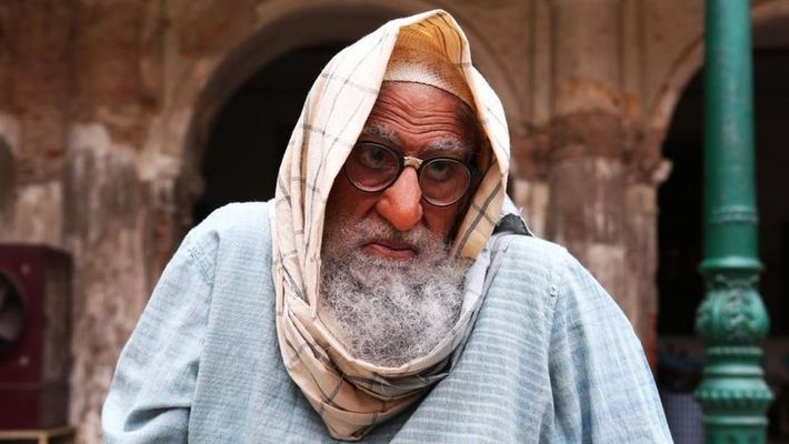 ന​ര​ച്ച താ​ടി​യും വ​ലി​യ മൂ​ക്കും വ​ട്ട​ക്ക​ണ്ണ​ട​യു​മാ​യു​ള്ള അ​മി​താ​ഭ് ബച്ചൻ