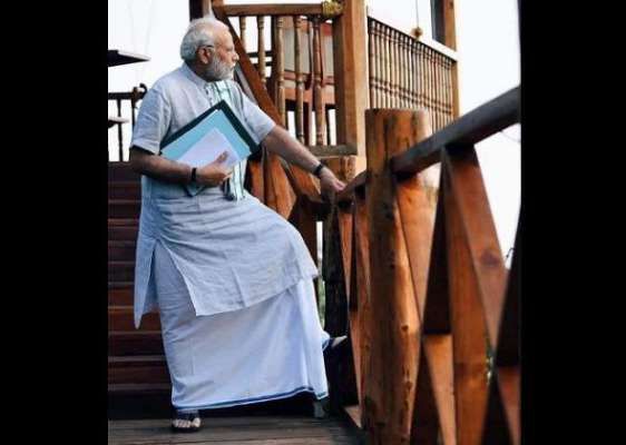 മോടികൂട്ടി  മോദിയുടെ  പുതിയ ലുക്ക്