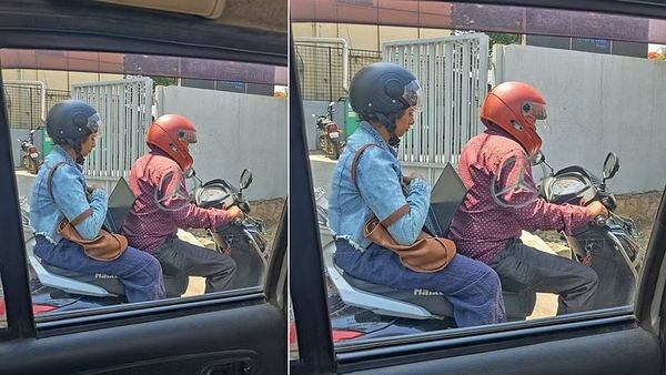 ട്രാഫിക് ബ്ലോക്കിനിടയിൽ ലാപ്ടോപ്പിൽ ജോലി ചെയ്യുന്ന യുവതി: ചിത്രം ശ്രദ്ധനേടുന്നു