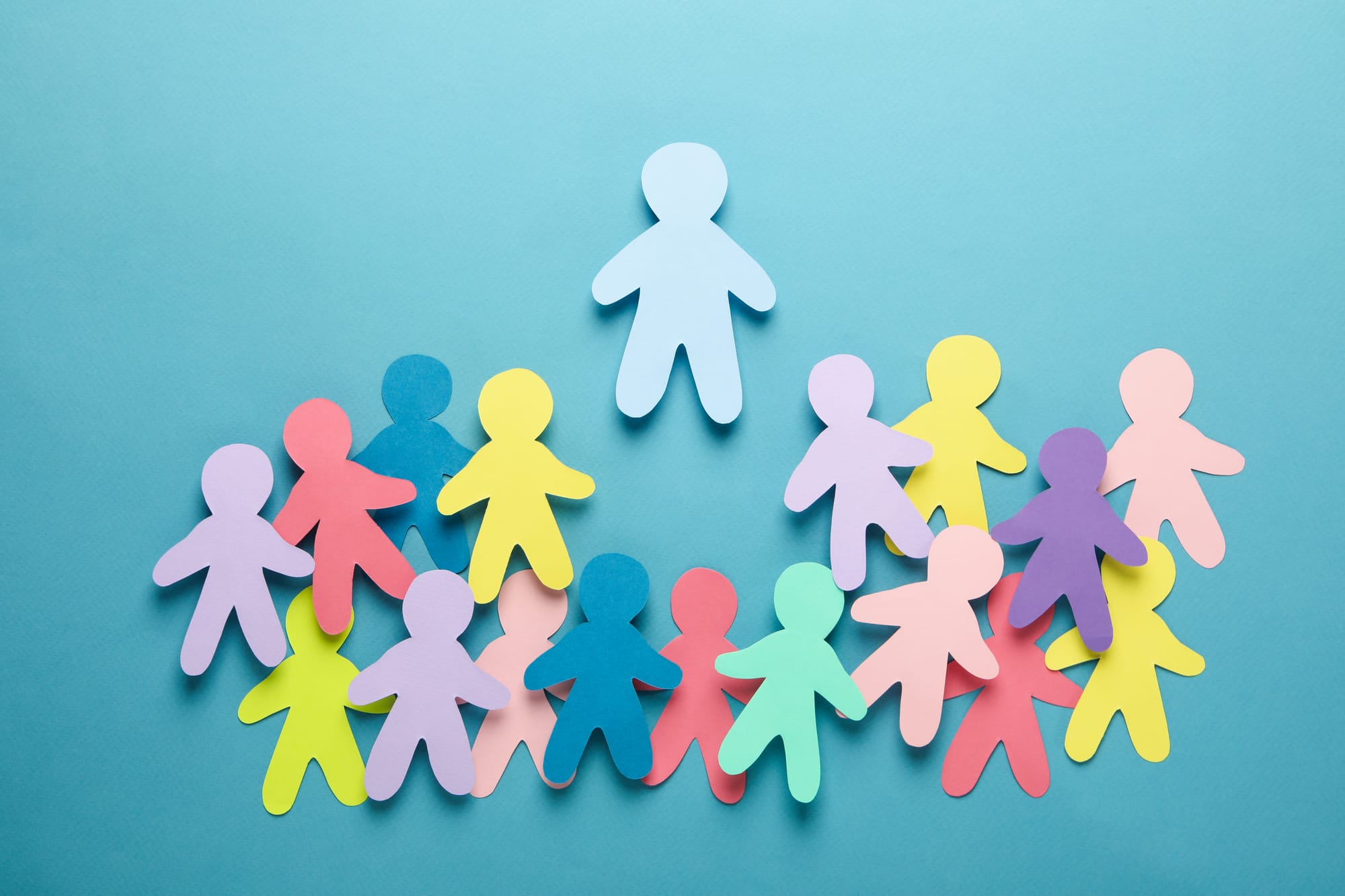 Paper cut outs of people