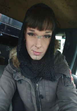 Close-up of Epona Rose, a transgender woman in Flagstaff, photographed at a rally advocating for her release and raising awareness of Flagstaff transgender violence issues.