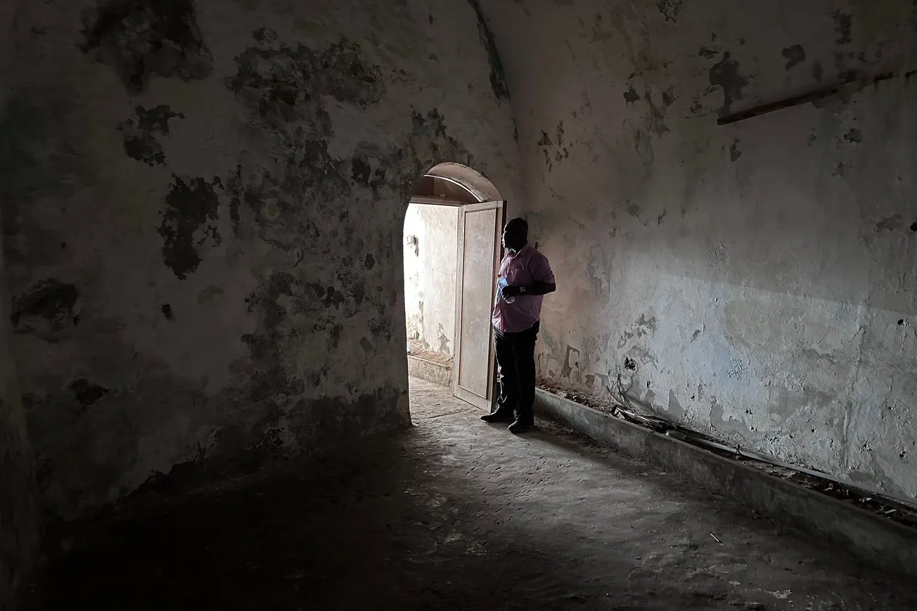 Tour Guide in Women's Dungeon, Osu Castle, Accra, Ghana [Frederick Lane, 2023]