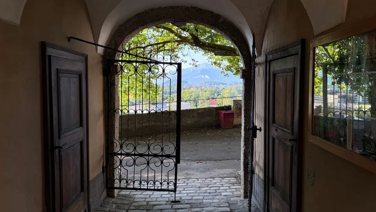 A photo showing  view of the Untersberg from the entrance to Nonnberg Abbey, Salzburg, Austria [Frederick Lane 2024]