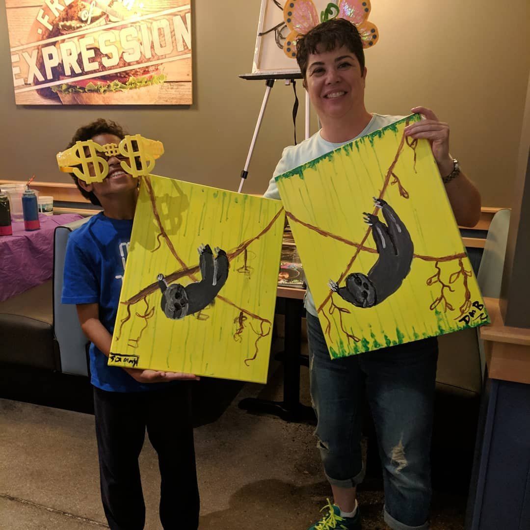 Mother and son at a kids paint party with the original Paint Nite