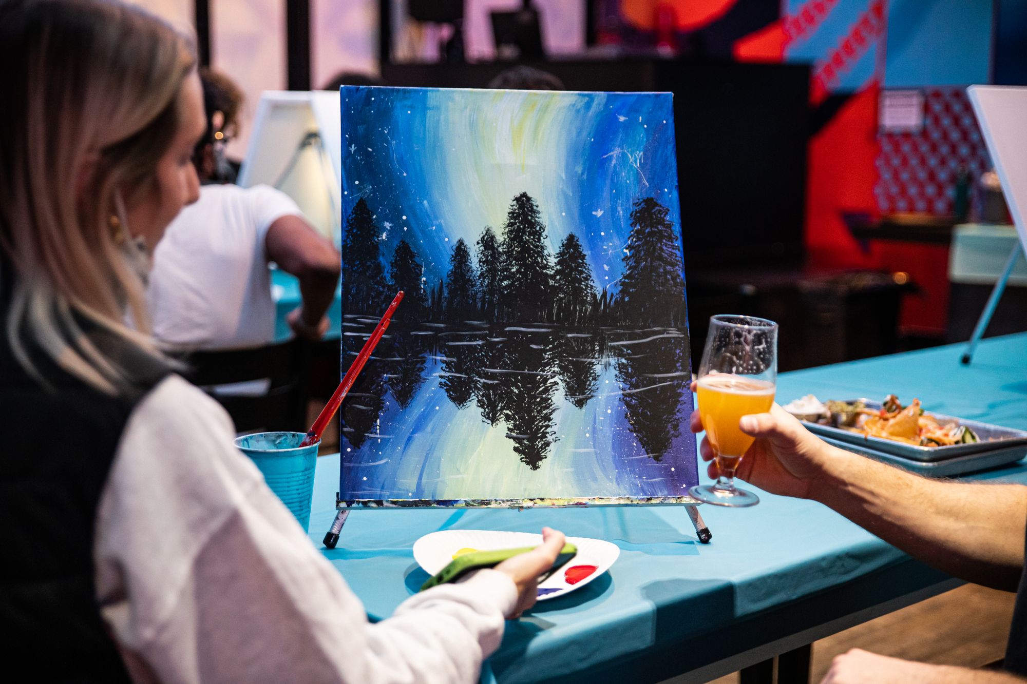 Completed painting at couples Paint Nite in a bar