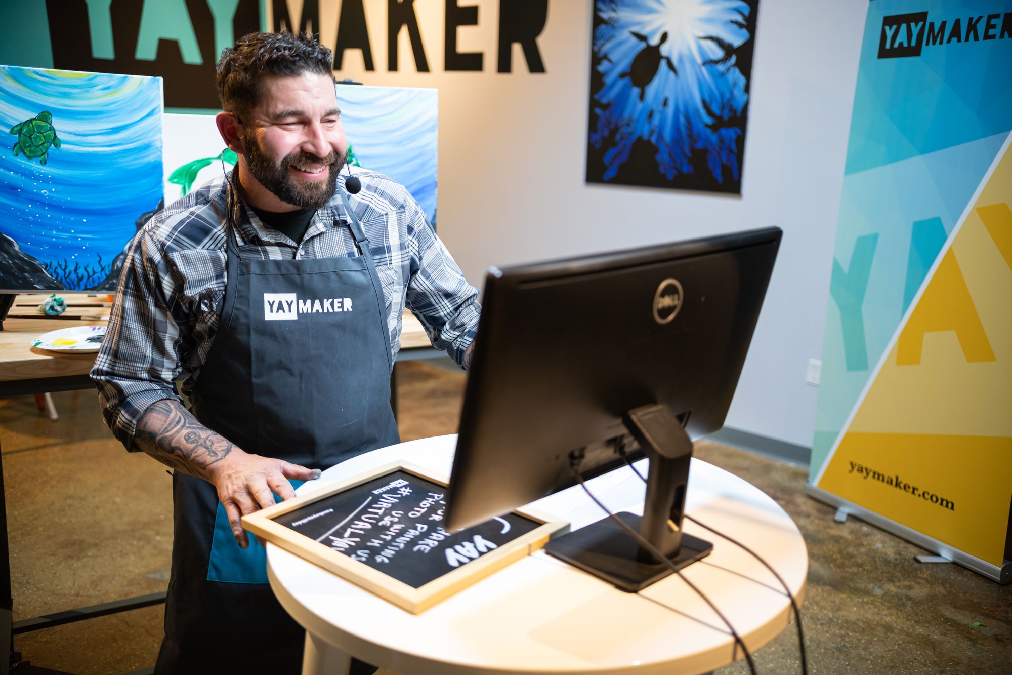 Virtual Paint Nite (formerly Yaymaker) host talking to guests on screen