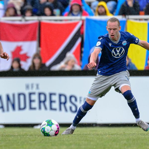 Meet the fan behind the flags at Wanderers Grounds. And no, it's not Callum Watson.