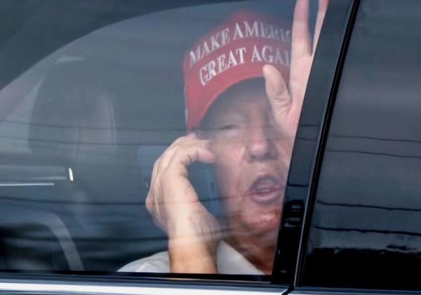 Donald Trump looking particularly disgusting being transported away to play golf while the markets were in flux on April 4, 2025.